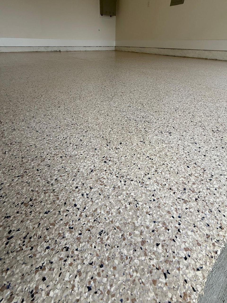 Light flake, garage — a real floor finished by Epoxy Living
