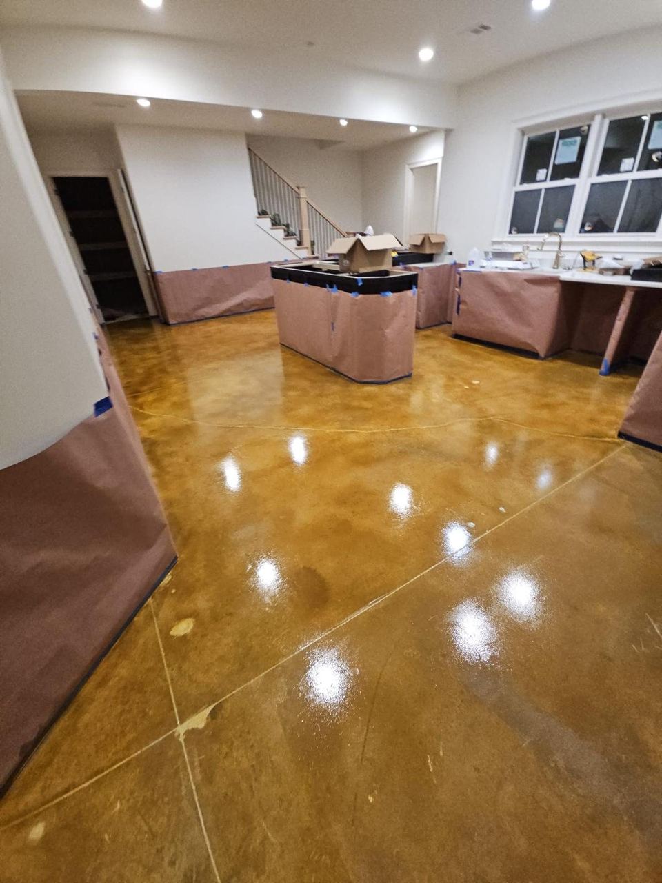 Gold-toned floor, kitchen & basement — a real floor finished by Epoxy Living