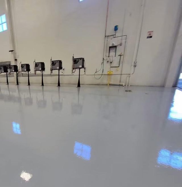 Solid light grey, commercial floor: solid polyaspartic floor, commercial