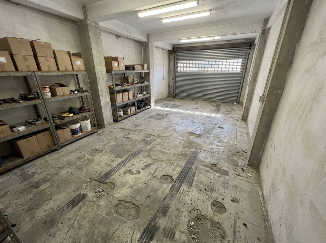 Worn floor before coating — commercial project