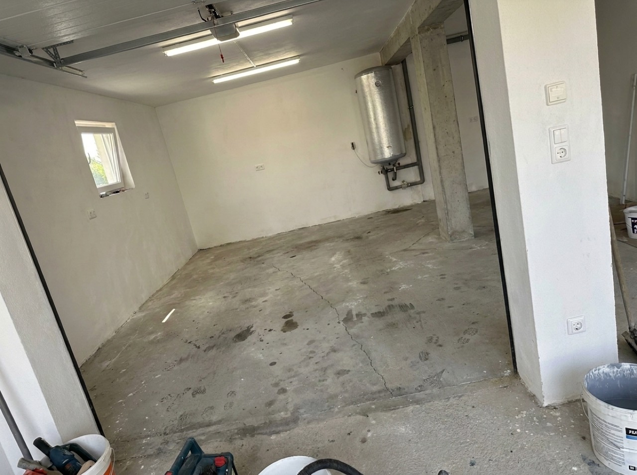 Worn floor before coating — 2-car project