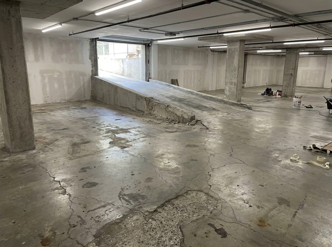 Worn floor before coating — commercial project